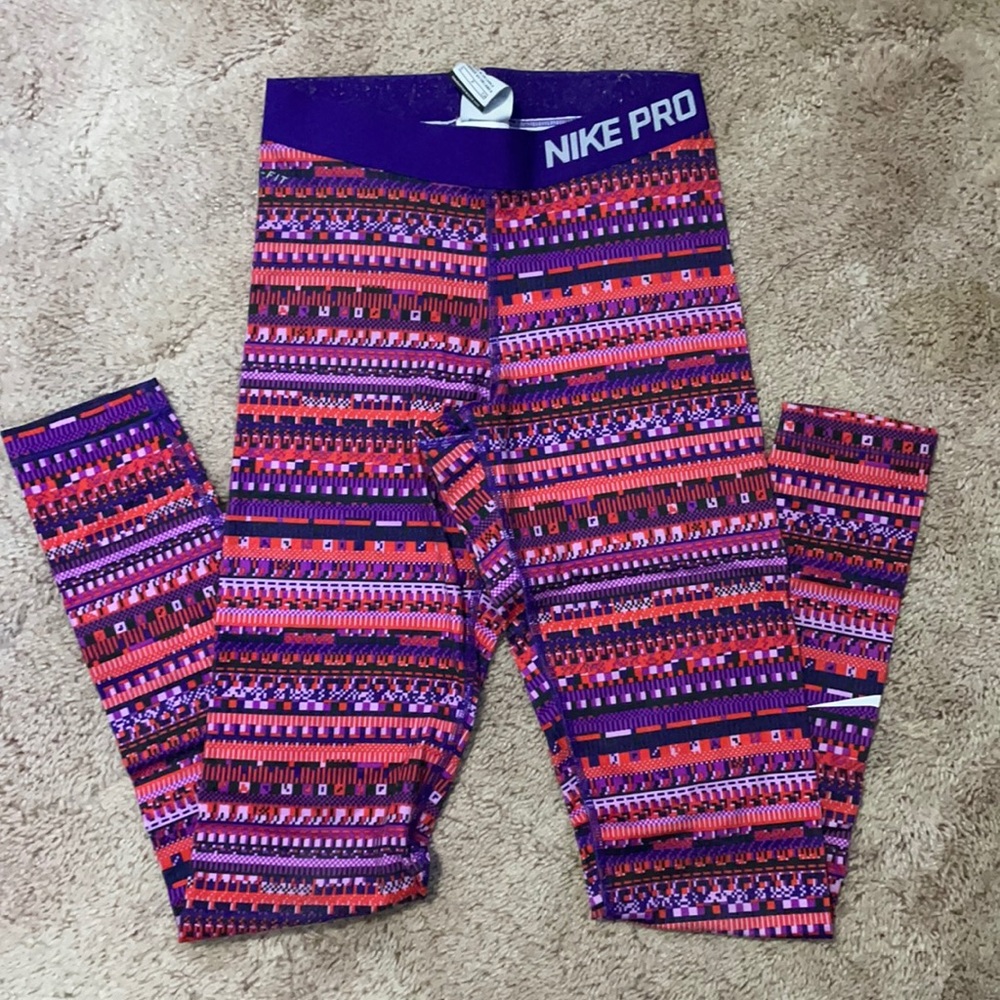 pink and purple nike pro leggings